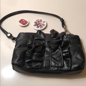 New York & Company Black Vegan Leather Ruffle Accent Zip Wristlet